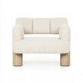 Sillón con brazos cilíndricos y asiento claro - beige