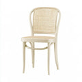 Silla con respaldo de rejilla y patas curvas - beige